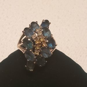 Blue and white stone 18 k gold electra plate ring.